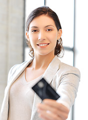 Image showing happy woman with credit card