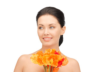 Image showing lovely woman with red flowers