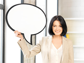 Image showing smiling businesswoman with blank text bubble