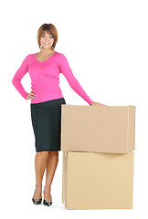 Image showing attractive businesswoman with big boxes