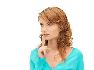 Image showing teenage girl with finger on lips