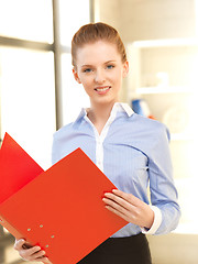 Image showing beautiful woman with folder