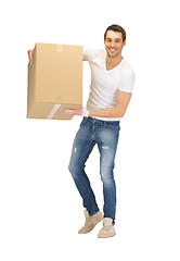 Image showing handsome man with big box