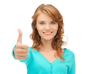 Image showing teenage girl with thumbs up