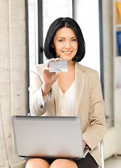 Image showing happy woman with credit card