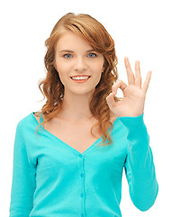 Image showing teenage girl showing ok sign