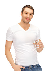 Image showing man in white shirt with glass of water