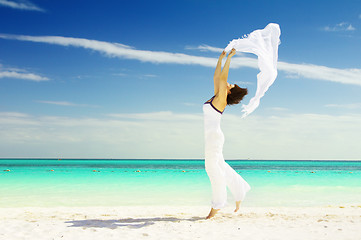 Image showing happy woman with white sarong