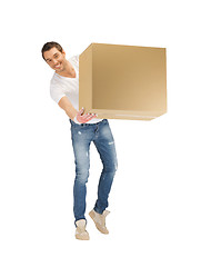 Image showing handsome man with big box