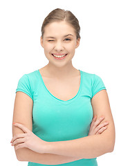 Image showing winking teenage girl