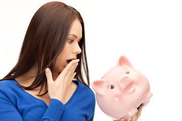 Image showing lovely woman with piggy bank