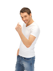 Image showing man in white shirt making inviting gesture