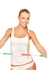 Image showing young beautiful woman with measure tape