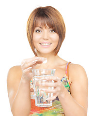 Image showing woman with pill and glass of water