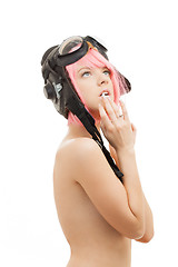 Image showing topless pink hair girl in aviator helmet