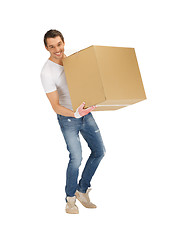 Image showing handsome man with big box