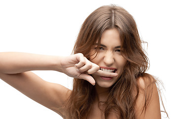 Image showing woman biting her finger