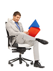 Image showing man with folders