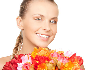 Image showing lovely woman with red flowers