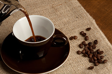 Image showing cup of coffee and beans