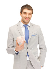 Image showing man with piggy bank