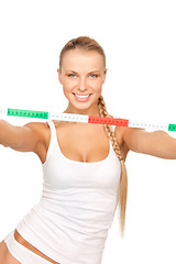 Image showing young beautiful woman with measure tape