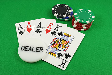 Image showing Full House with a dealer chip on top