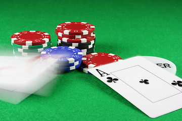 Image showing Poker - Beat that - A pair of aces thrown on the baize