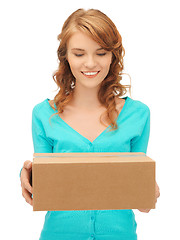 Image showing teenage girl with cardboard box