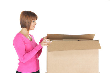 Image showing attractive businesswoman with cardboard box