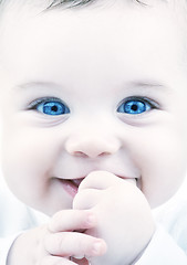 Image showing adorable baby with blue eyes