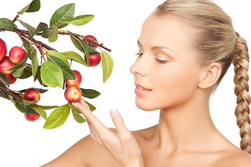 Image showing lovely woman with apple twig