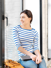 Image showing happy and smiling teenage girl with laptop