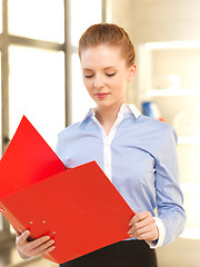 Image showing calm woman with documents