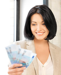 Image showing lovely woman with euro cash money