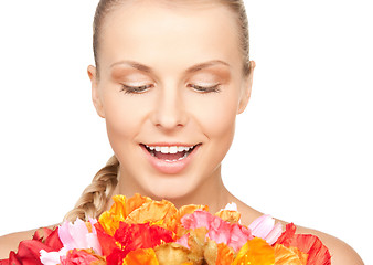 Image showing lovely woman with red flowers