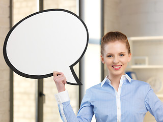 Image showing smiling businesswoman with blank text bubble