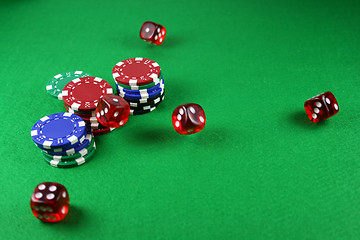 Image showing An Action shot of 5 dice thrown onto the table