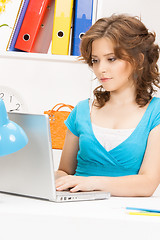 Image showing happy woman with laptop computer