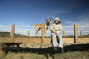 Image showing The girls and is dog