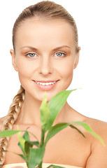 Image showing woman with green sprout