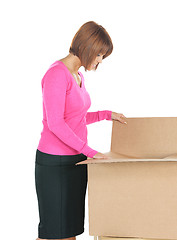 Image showing attractive businesswoman with big boxes