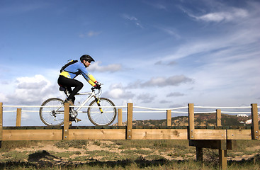 Image showing Riding a bike