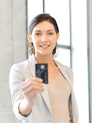 Image showing happy woman with credit card