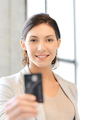 Image showing happy woman with credit card