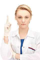 Image showing female doctor with her finger up