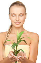 Image showing woman with green sprout