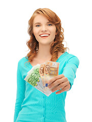 Image showing happy teenage girl with euro cash money