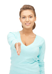 Image showing woman with an open hand ready for handshake