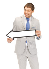 Image showing businessman with direction arrow sign